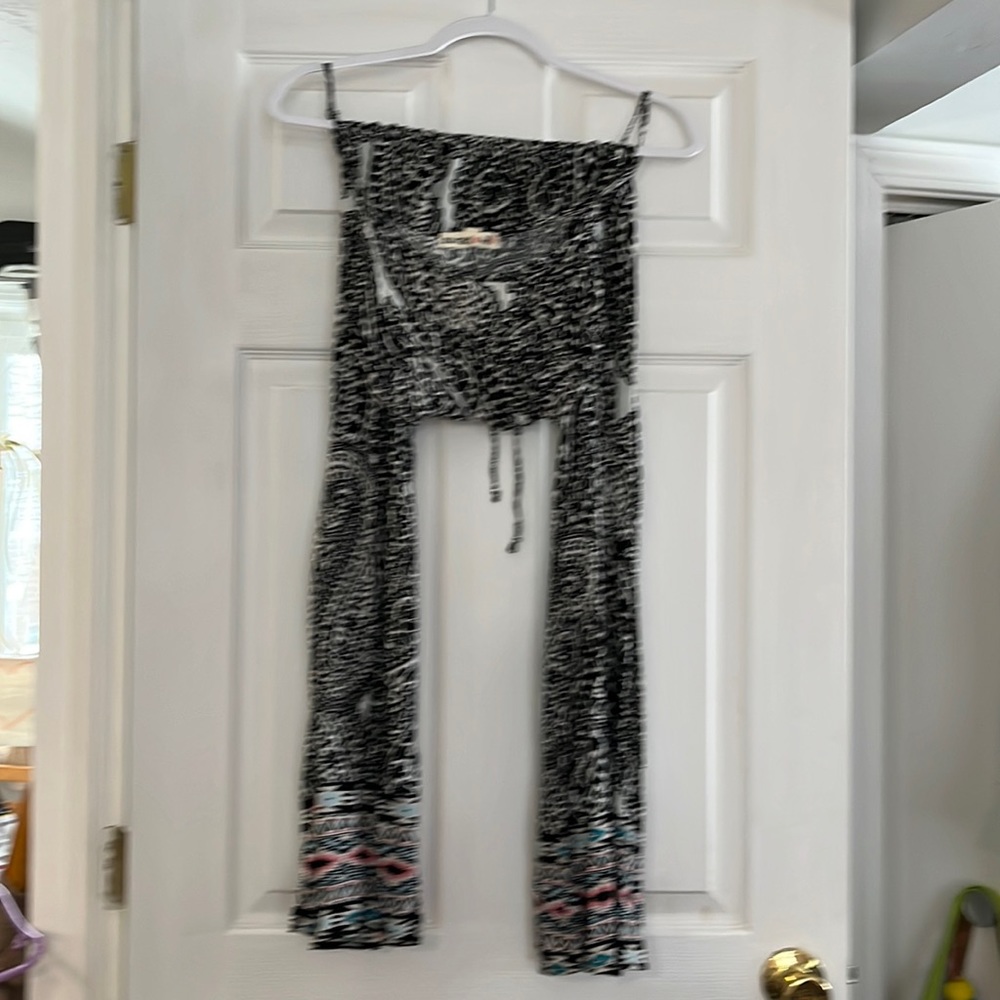 Black kind of hippie design jumpsuit spaghetti strap small